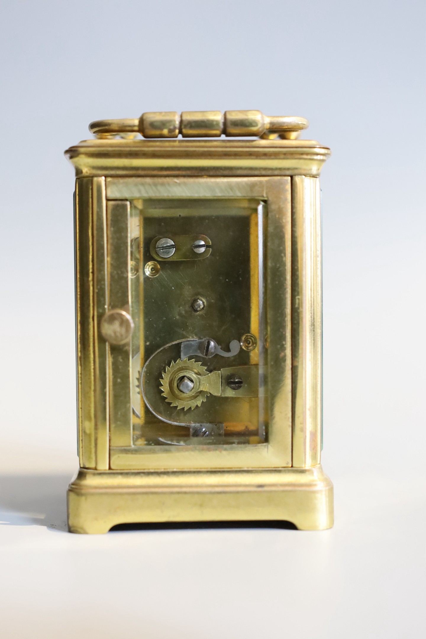 A 19th century French lacquered brass miniature carriage timepiece, height 7cm